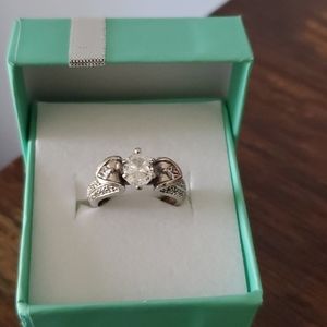 .81 solitare oval diamond ring, .5 diamond 18k set